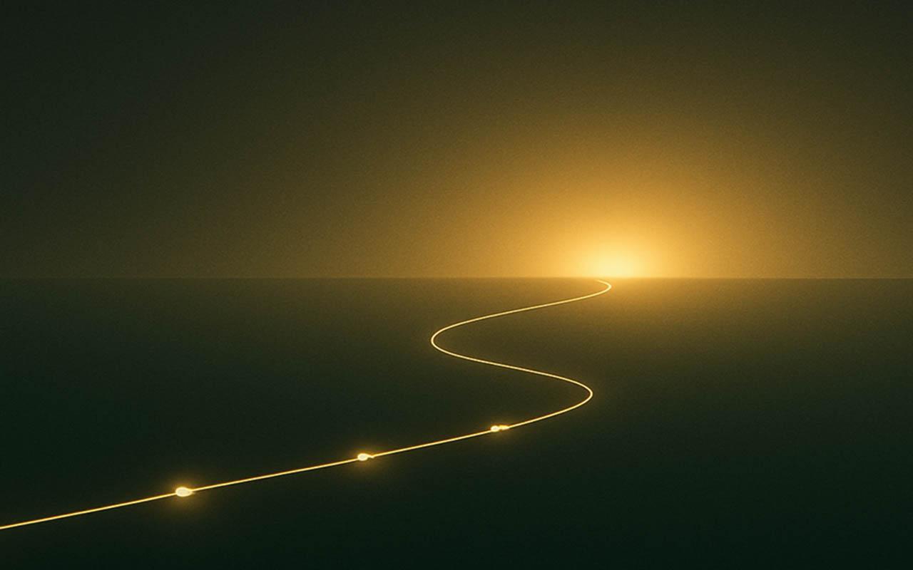 The road to prosperity — a glowing golden path leading toward a bright horizon